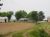 The nearby farm buildings..